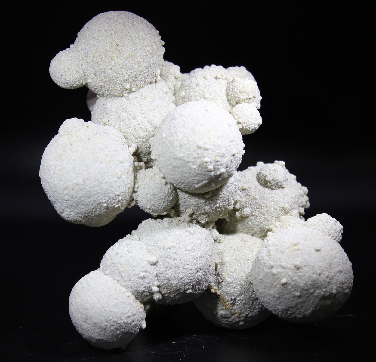 Rounded sand calcite aggregates from Mályi, Hungary