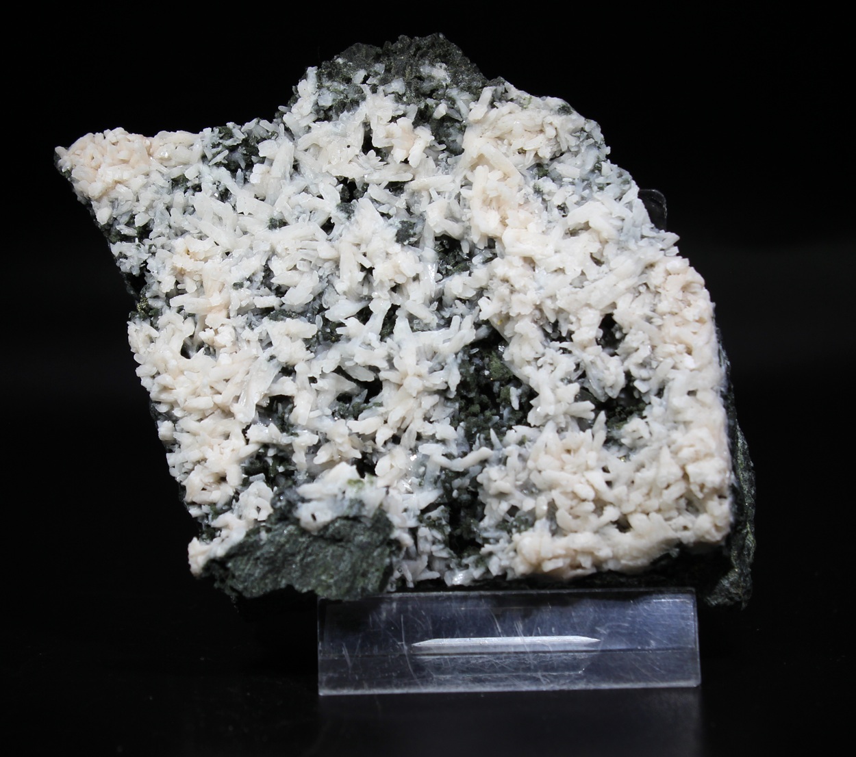 Albite crystals on dark matrix from Valberg Quarry Norway