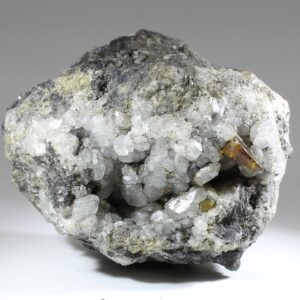 Parisit-(Ce) auf Calcit-Matrix aus der Muzo-Mine, Boyacá, Kolumbien