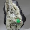 Emerald crystal on white calcite from the Muzo mining district