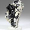 Babingtonite from Geirangerfjellet Norway with black crystals on light-colored matrix