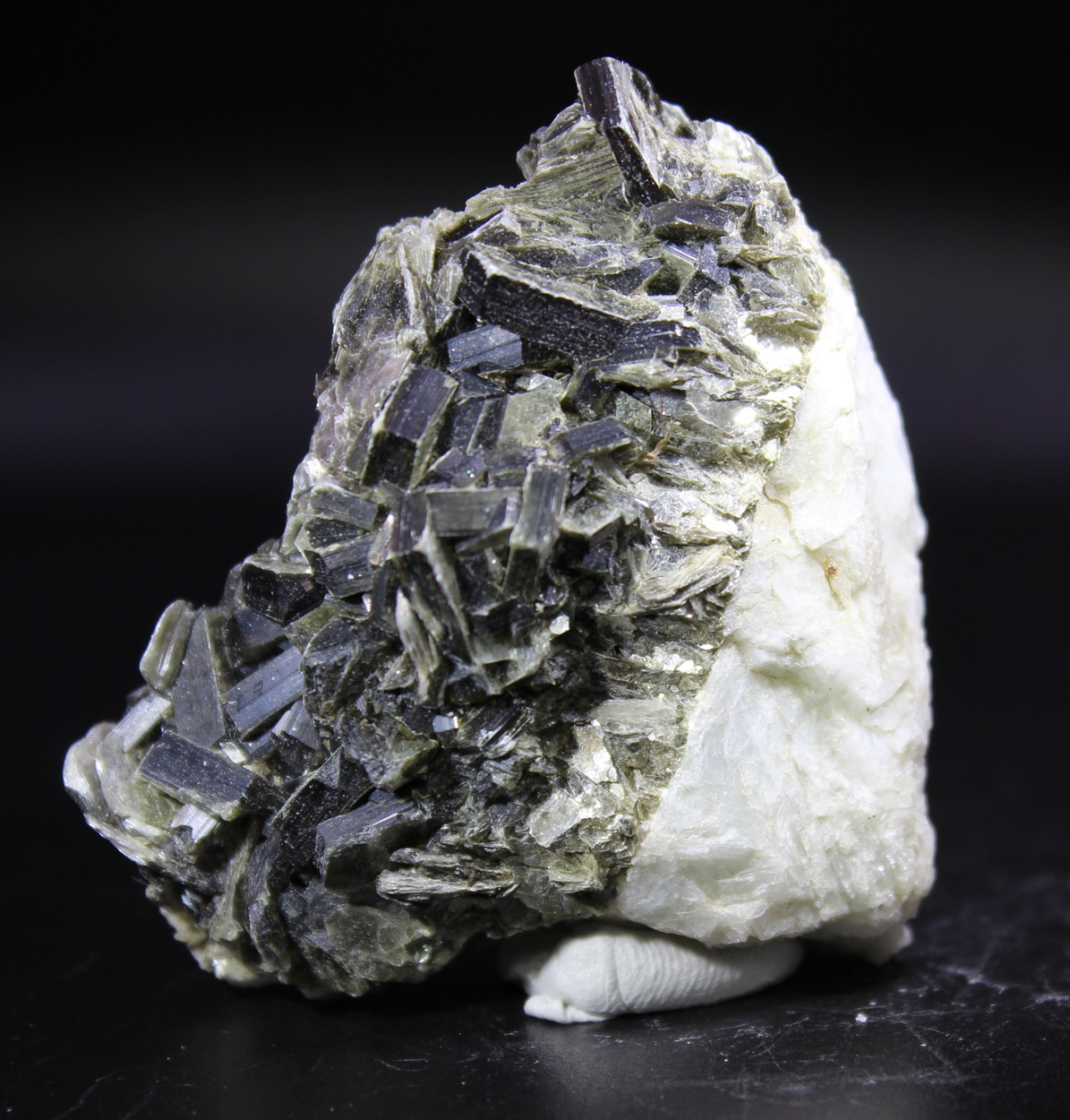 Gray to black Muscovite crystals from Halden Norway with dense crystal arrangement