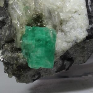 Green emerald crystal from Chivor Colombia on matrix