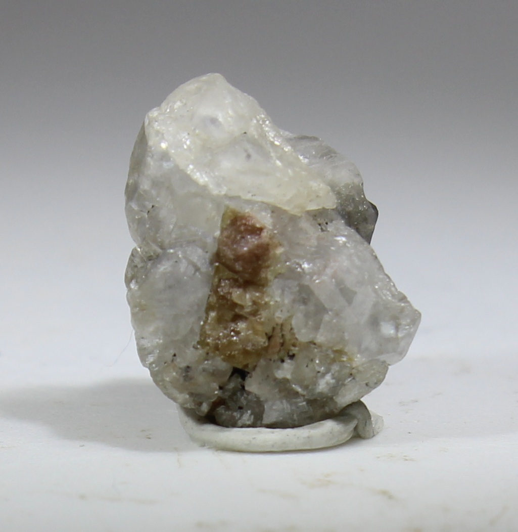 Rear view of Parisite-(Ce) on calcite from Muzo Colombia