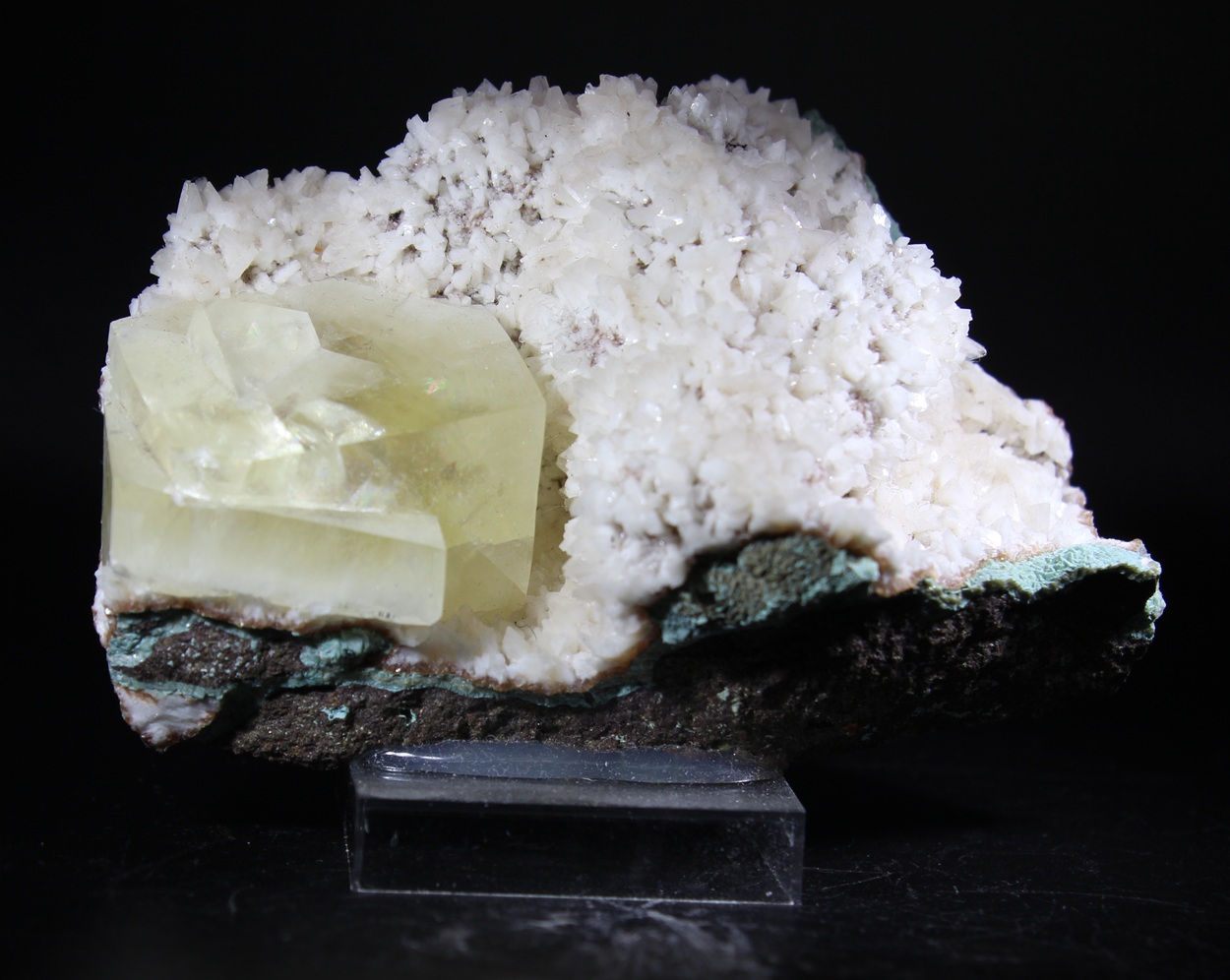 Calcite from Raigad India with yellow pseudocubic crystals on basalt