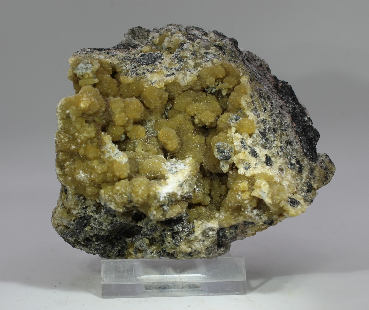 Stilbite with Magnetite from Leveäniemi Sweden with rounded yellowish aggregates