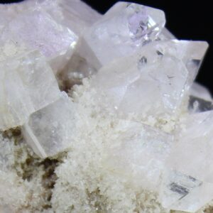 Detailed view of Apophyllite from the Pune District India on fine-crystalline matrix